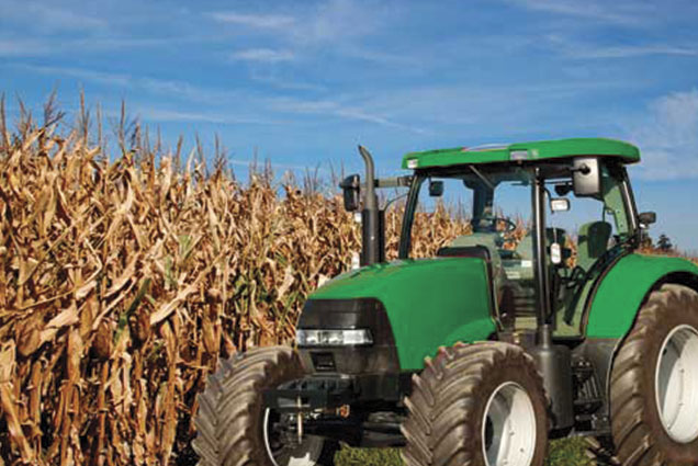 Tractor in a corn field